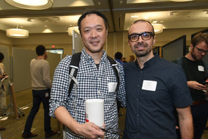 Two men smiling for the camera